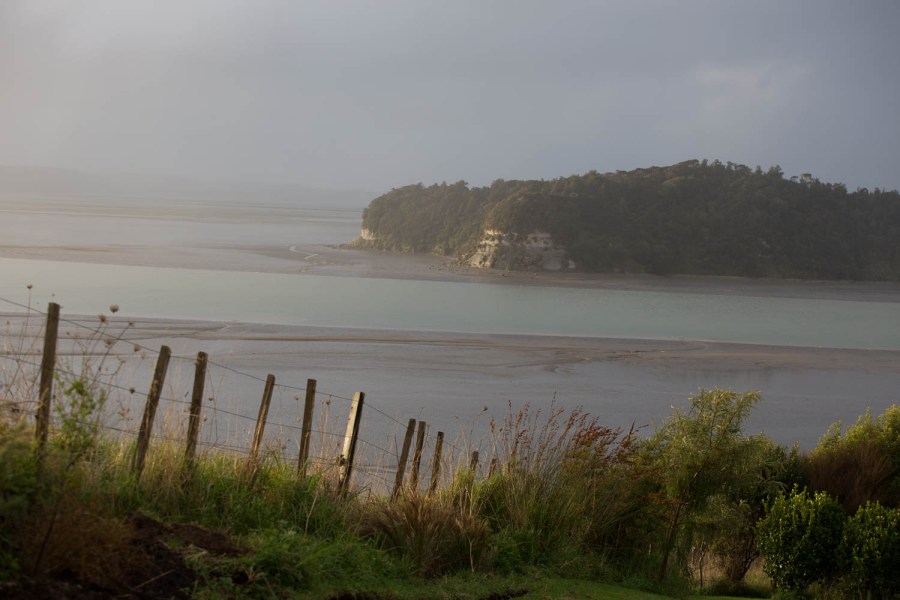 beach and channel at low tide end of day light
